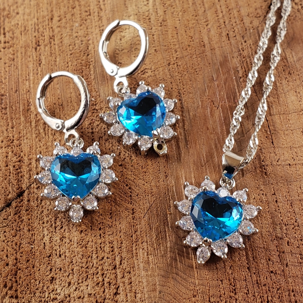 Heart shaped blue topaz colored crystal set